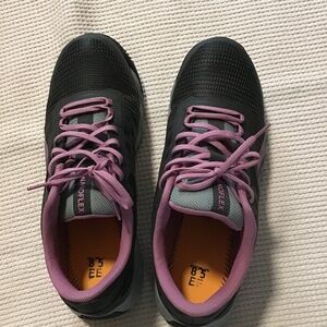 Steel toe shoes. Size 10.5 W for women. Color grey & pink .